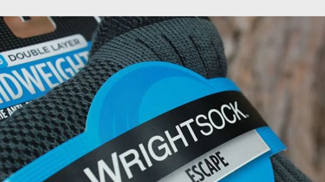 Close up on a plate of mashed potatoes, topped with baked pork chops with cream of mushroom soup, and a side of green beans.