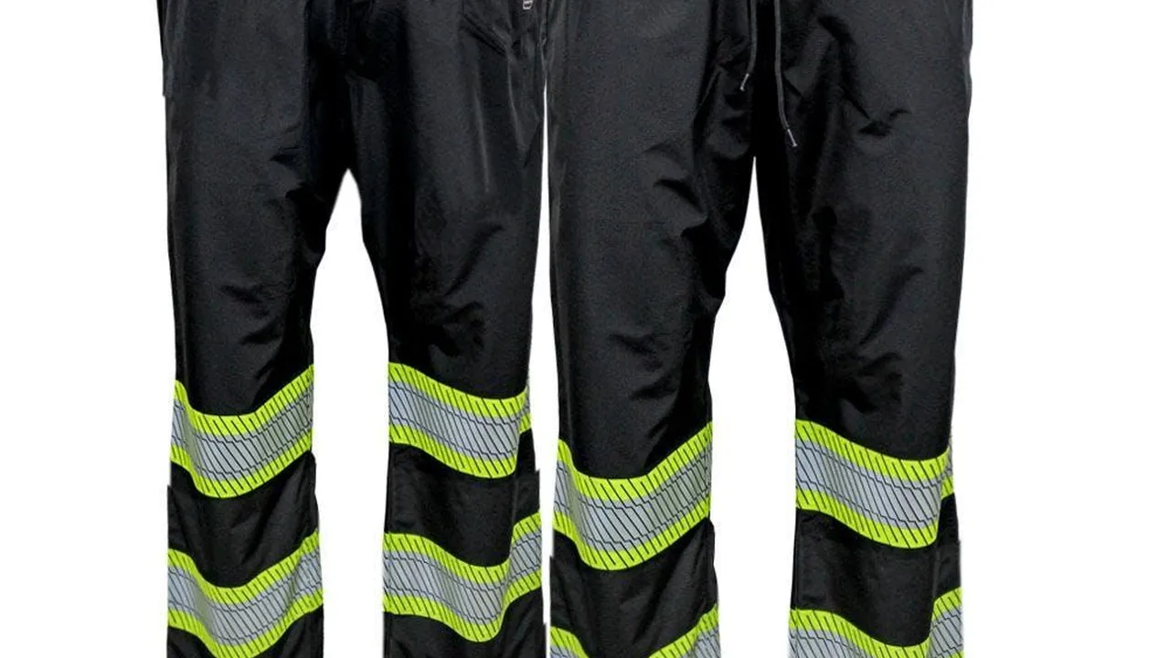 Close up on a plate of mashed potatoes, topped with baked pork chops with cream of mushroom soup, and a side of green beans.