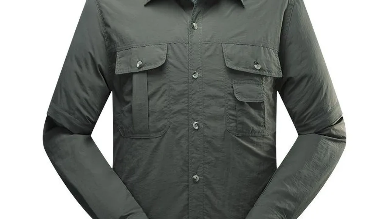 Close up on a plate of mashed potatoes, topped with baked pork chops with cream of mushroom soup, and a side of green beans.