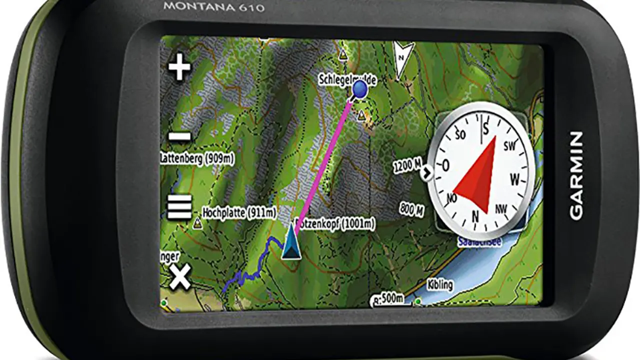 Close up on a plate of mashed potatoes, topped with baked pork chops with cream of mushroom soup, and a side of green beans.